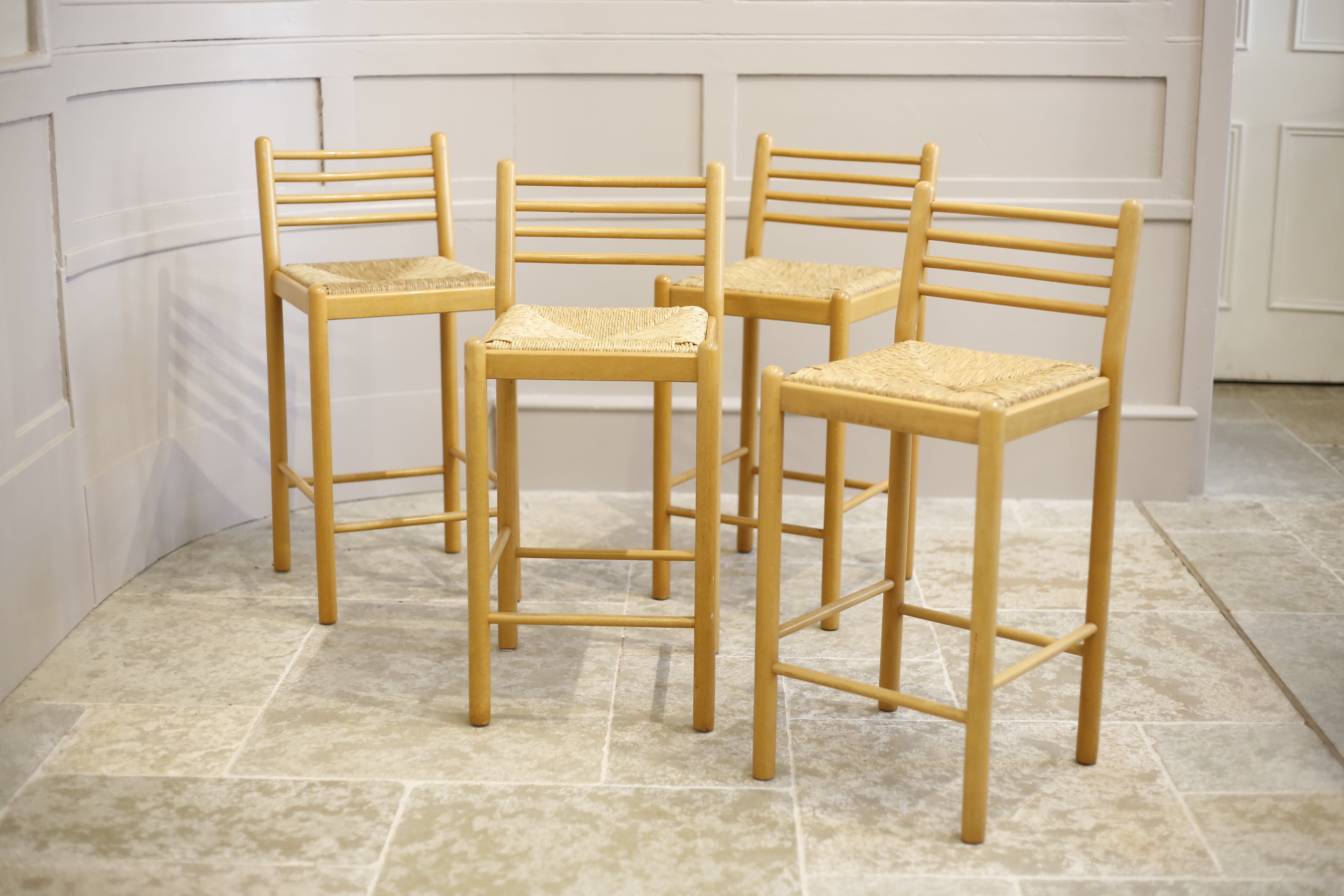 wooden bar stools with rush seats