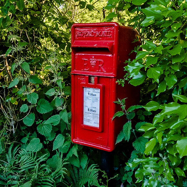 Royal Mail red postbox for sending birthday cards