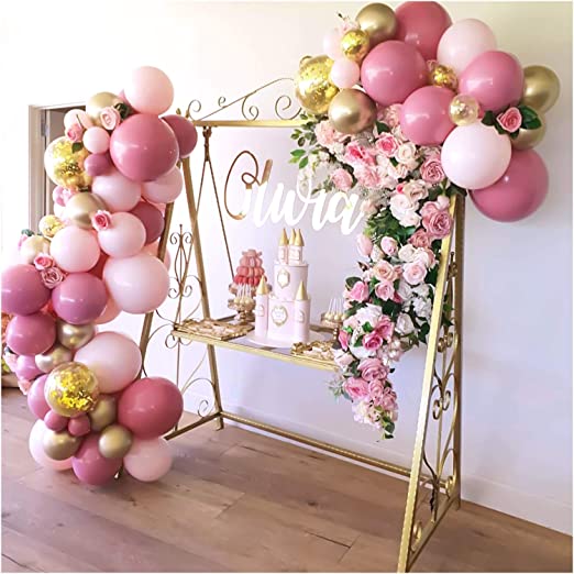 golden cake stand with pink balloons 