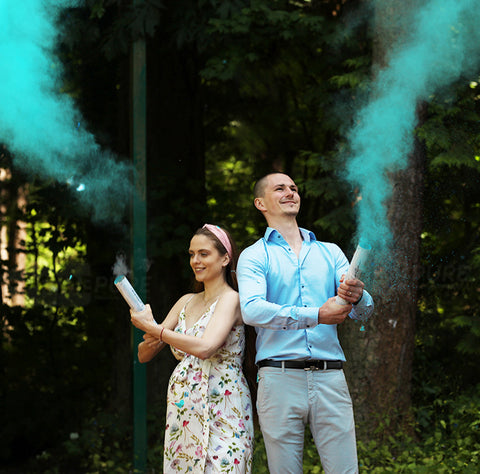 A couple popped 2 blue powder cannons for their gender reveal