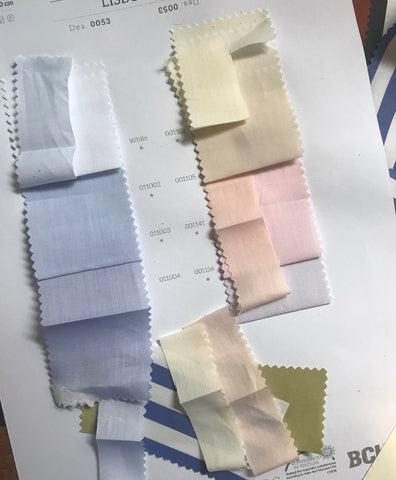 Saywood fabric sourcing process, should a cotton colour card, with bits of the cloth cut up into smaller movable pieces.