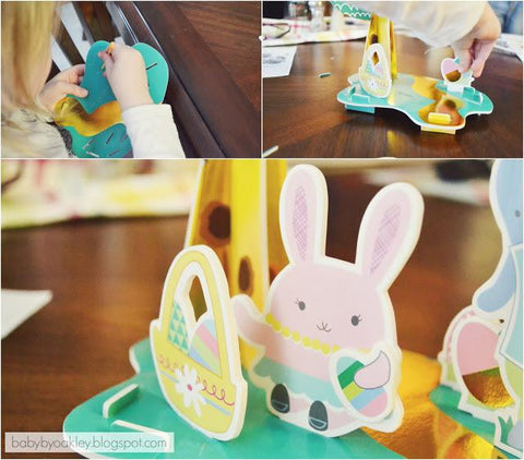 Child making Easter decorations and bunny
