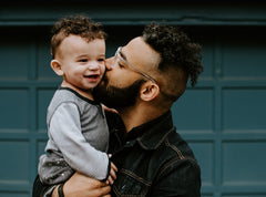 dad and son hugging