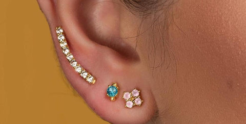Type de boucles d'oreilles : piercings