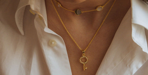 Gold plated key pendant combined with moon phase choker