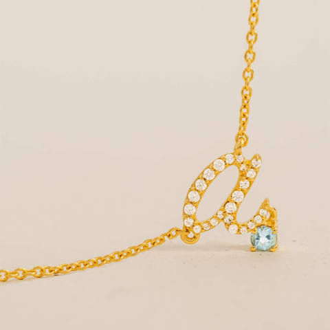 Initial necklace with aquamarine birthstone