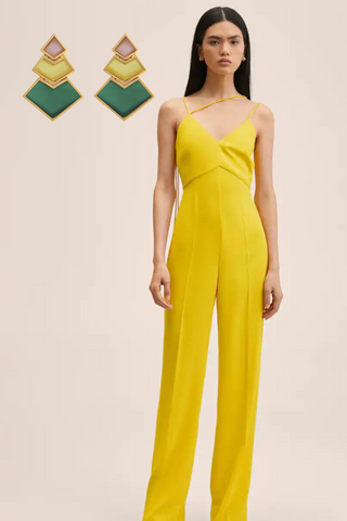 Simple yellow jumpsuit with large yellow guest earrings
