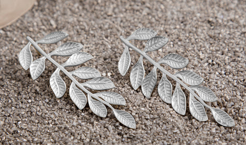 Long silver earrings with leaves with 3D engraving