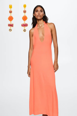 Event dress with orange dangling earrings