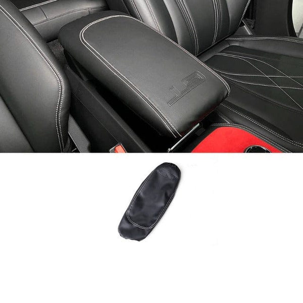 https://cdn.shopify.com/s/files/1/0266/2688/3639/products/pimpmyev-car-accessories-vegan-leather-armrest-cover-for-ford-mustang-mach-e-2021-2023-38841972982016_300x@2x.jpg?v=1680330367