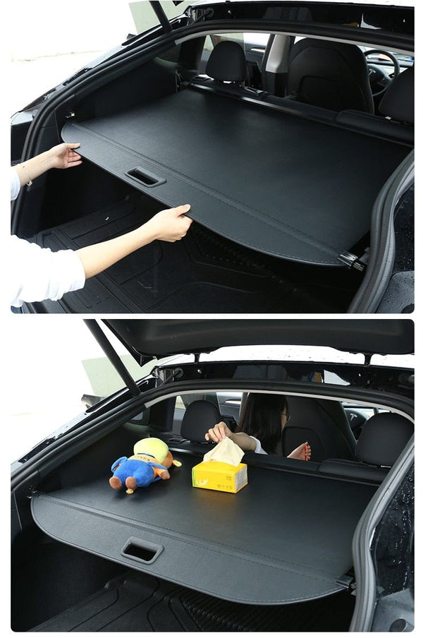 https://cdn.shopify.com/s/files/1/0266/2688/3639/products/pimpmyev-cargo-cover-rear-trunk-pull-out-cargo-cover-for-tesla-model-y-2020-2022-36473453019392_300x@2x.jpg?v=1642912281