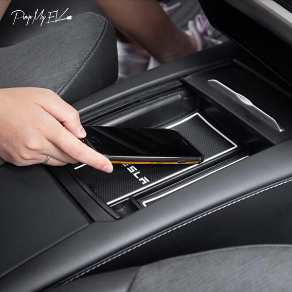 https://cdn.shopify.com/s/files/1/0266/2688/3639/products/pimpmyev-wireless-charger-qi-wireless-car-charger-storage-caddy-for-model-s-3-options-15104458883127_300x@2x.jpg?v=1602252273