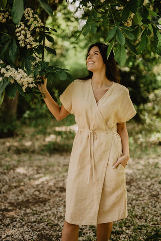 Woman Wearing A Yellow Linen Dress In A Park