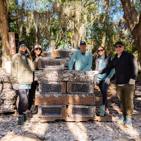 Group next to wire oyster cages