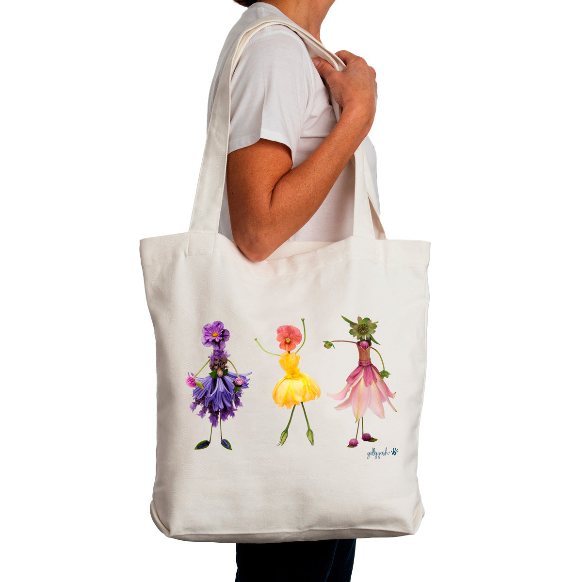 Featuring three pretty flower girls dancing on this strong everyday cream cotton canvas tote bag by Golly Gosh Creations.