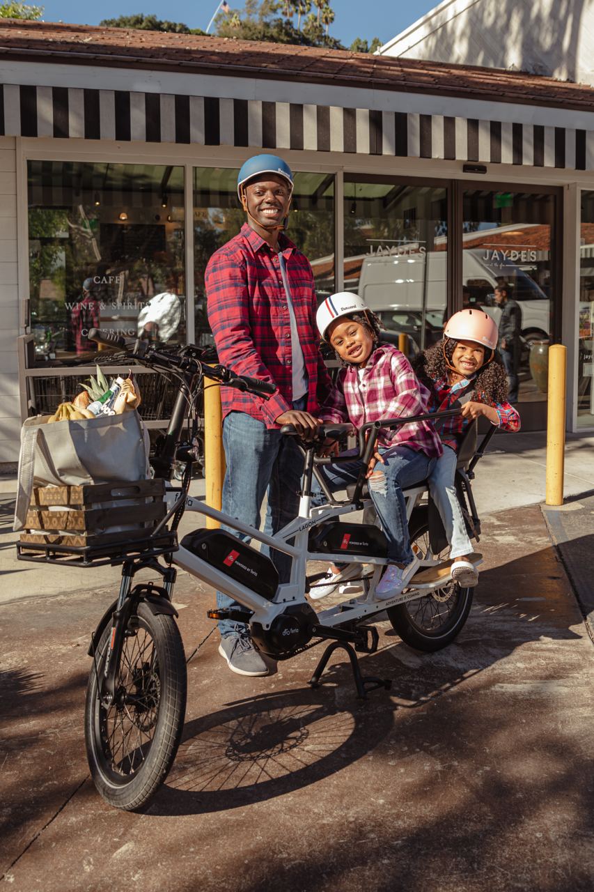 The long-tail cargo bike is capable of carrying two children 