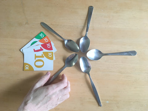 Spoons game layout with 4 of a kind