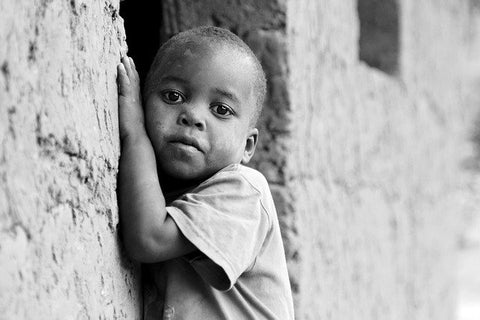 Black boy living in poverty