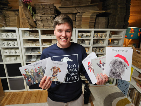 Claire holding some christmas cards