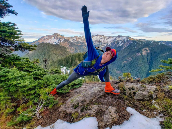 Karina in front of an excellent mountain overlook