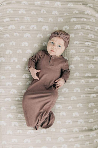 baby in knot gown