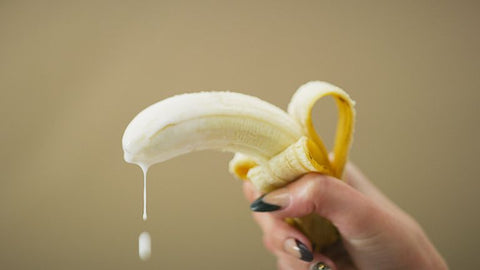 milk dripping from banana, penis that wants to ejaculate