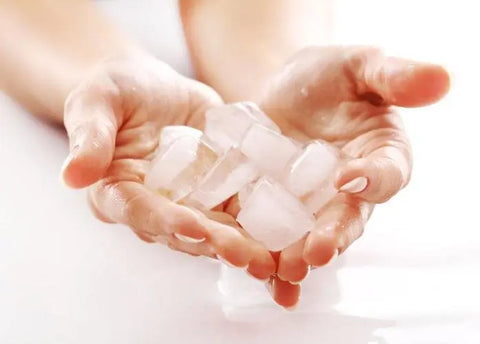 ice cubes in hand