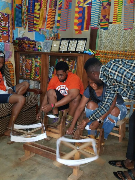 Jacob Reed spinning cotton into thread in West Africa 2018