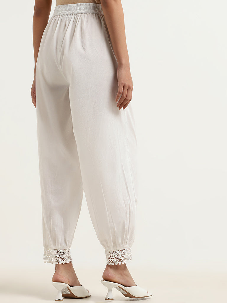 Buy White Solid Cotton Trousers Online at Rs.671 | Libas