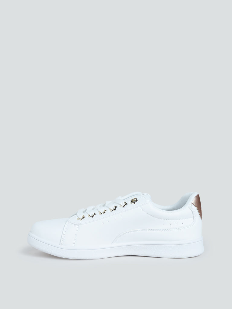 white faux leather sneakers