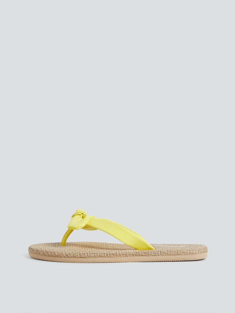 yellow bow flip flops