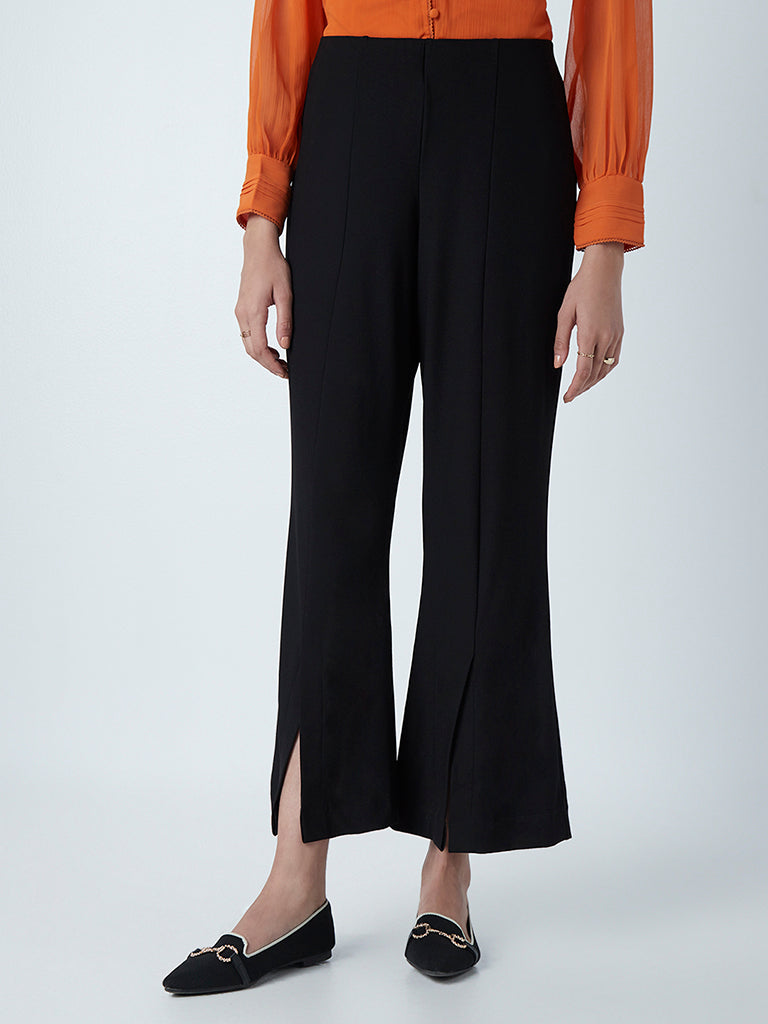 Twenty Dresses by Nykaa Fashion Trousers and Pants  Buy Twenty Dresses by  Nykaa Fashion Work Black Solid Wide Leg Trousers Online  Nykaa Fashion