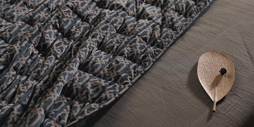 Top View of YNM Infinite Weighted Blanket On Bed