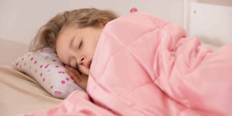 Young Girl Asleep Under YNM Weighted Blanket