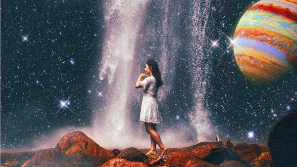 A collage art of a woman standing in the galaxy with a waterfall and planets