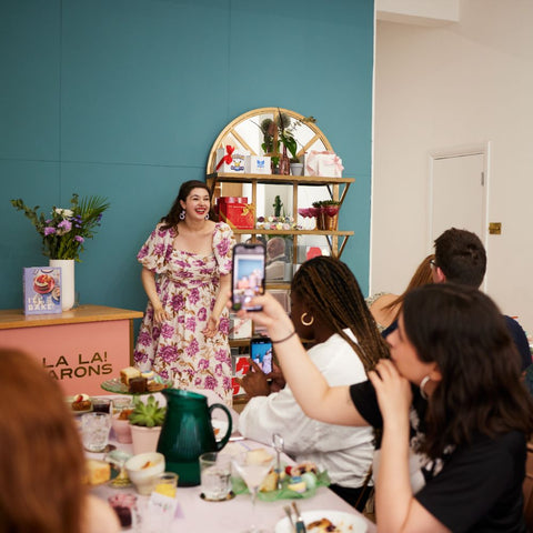Liberty Mendez presenting her book I'll Bake at her launch event at Oh La La! Macarons