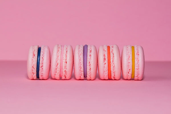 Pink macarons on a pink background 