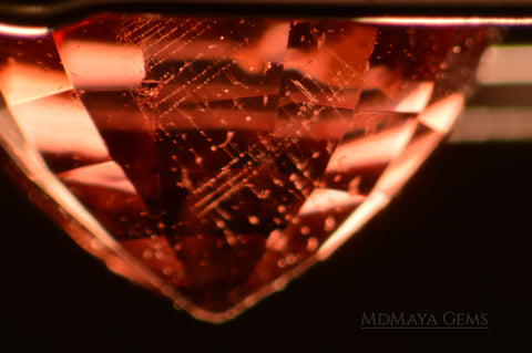 Spinel Inclusions dislocations in orange - red spinel