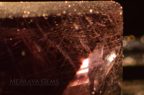 Solid Inclusions in Reddish Purple Spinel 2.28 ct