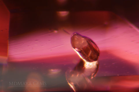 solid inclusions in pink spinel