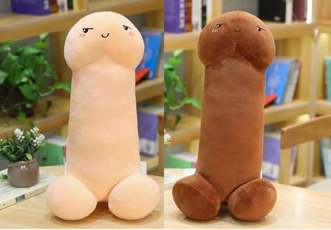 Two penises with a cheeky grin that are plush toys