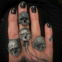 Kathleen wearing 4 925 skull rings