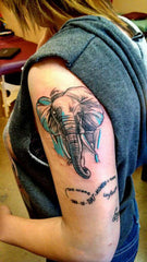 tatoo elephant arriere du bras 