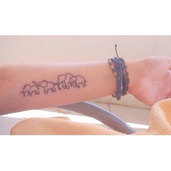 tatouage famille elephant