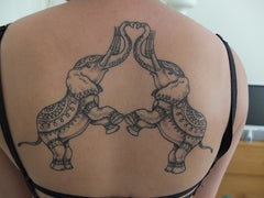 tatouage elephant avec un coeur