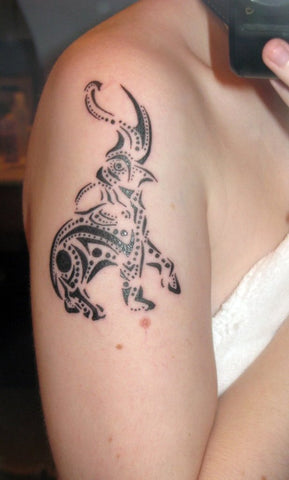 tatouage elephant tribal sur le bras