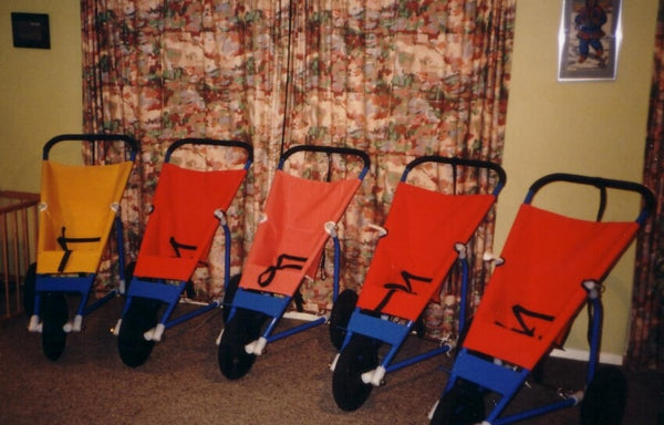 prototype baby buggies lined up for inspection - Mountain Buggy