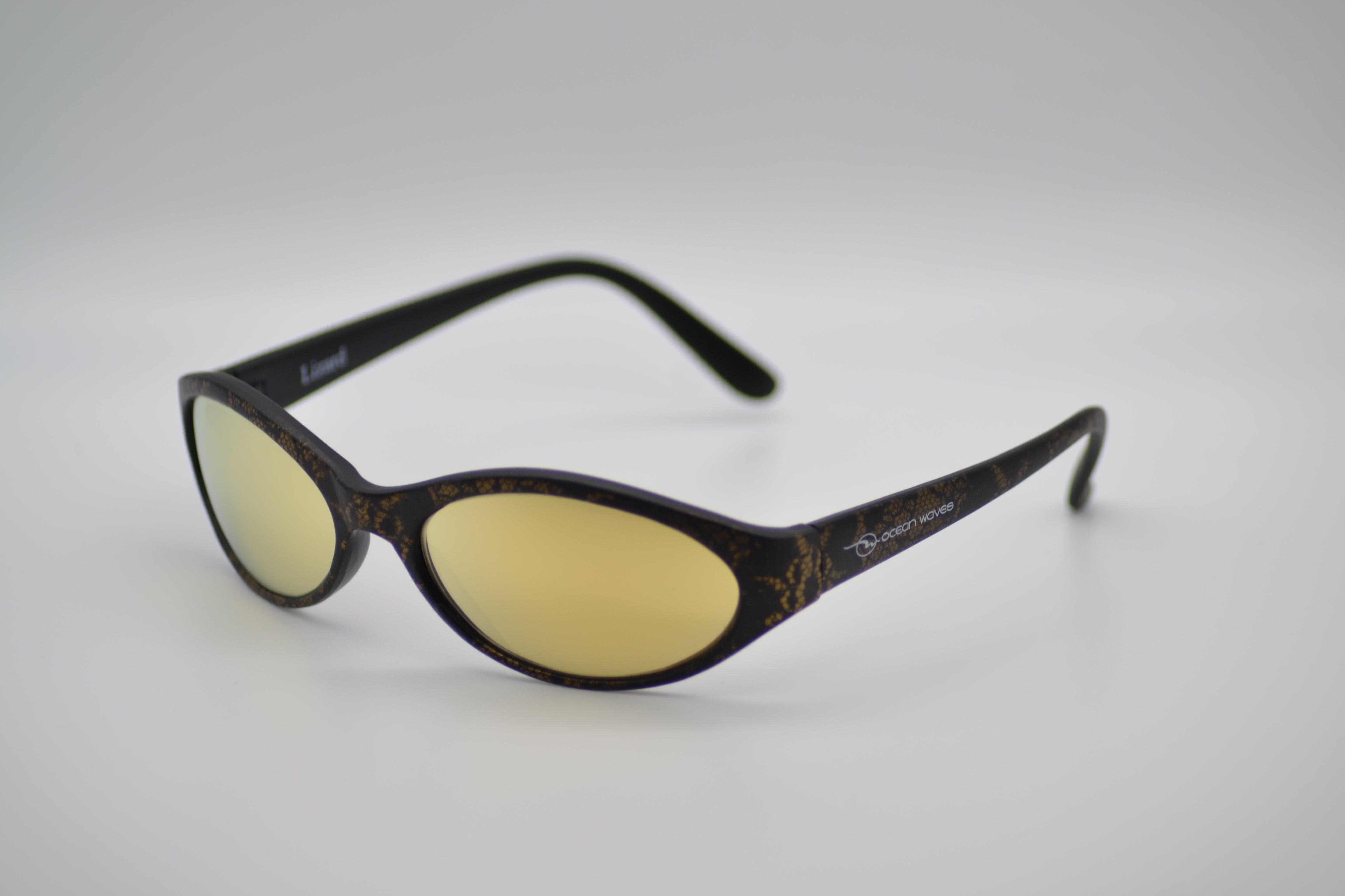 ocean waves sunglasses gold emblem on side