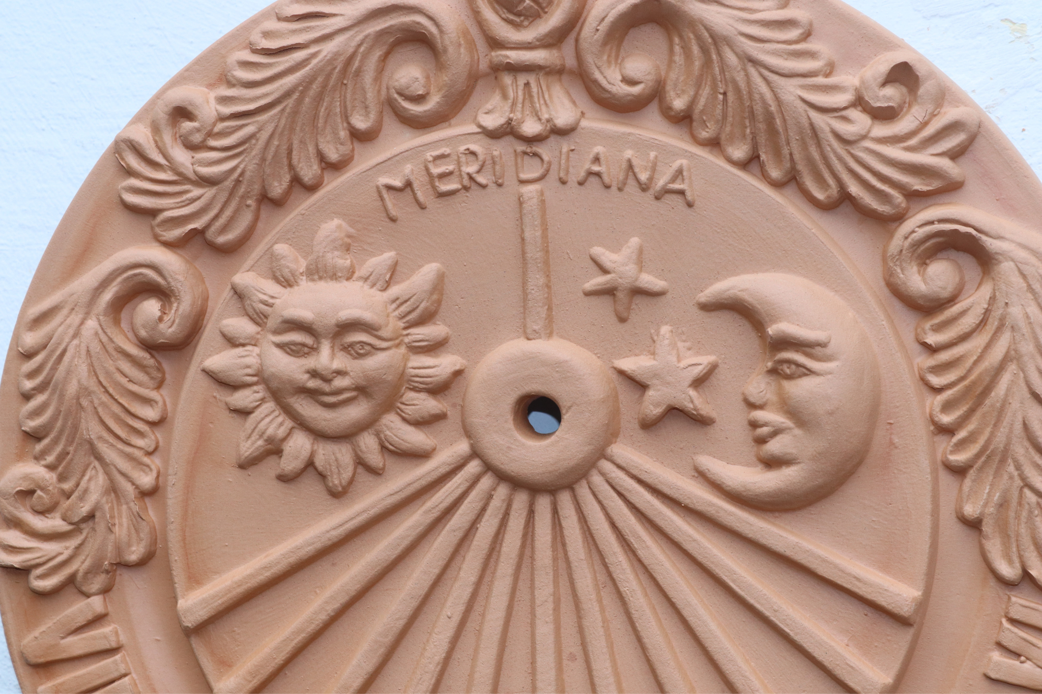 merdiana in terracotta per parete