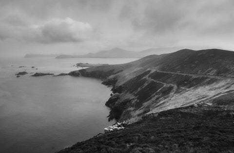 A black and white image of the view from the top of the Great Blasket Island. 
